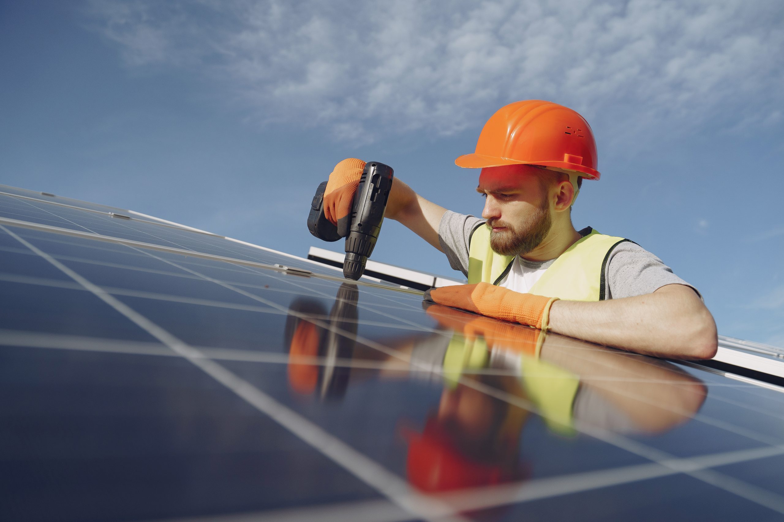 Man installing solar panel